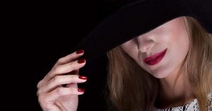 Woman Wearing Black Hat